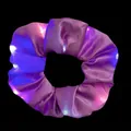 Detailed view of a purple LED hair scrunchie with vibrant neon glowing light effects - LED Glowing Style / Purple