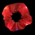 Detailed shot of red LED glowing hair scrunchie featuring multiple light modes for parties - LED Glowing Style / Red