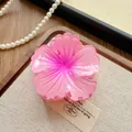 Close-up detail of a fashion pink gradient flower hair claw clip on rustic canvas props - Camellia / 8cm / Rose Red