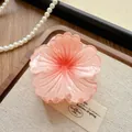 Detailed view of a pink gradient flower hair claw clip on a wooden display tray - Camellia / 8cm / Pink with Red Core