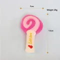Giocattolo per cani in peluche a lecca-lecca rosa con squittio, 7x13cm e dettaglio cuore - Lecca Lecca Rosa