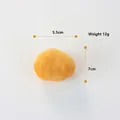 Piccolo gioco di peluche giallo per cani, dimensioni 5,5x7 cm e peso 12 g. - Uovo al Tè