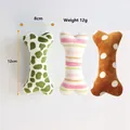 Giocattolo di peluche a forma di osso per cani con vari motivi, altezza 12 cm, 12 g - Osso Colore Casuale