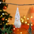 Close-up of white plush Christmas gnome ornament with silver patterned hat - Beard Style White Hat