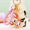 Llavero de cangrejo dorado con pedrería rosa y elegante correa trenzada para bolso - Cuerda Rosa + Cangrejo Pequeño de Cristal Rosa / Embalaje individual en bolsa OPP
