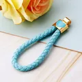 Elegant light blue braided rope keychain featuring a golden heart enamel pendant charm for bags - Heart Rope Sky Blue - No Clasp / Single OPP Bag Packaging