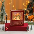 Palla di neve natalizia creativa a forma di libro con la slitta di Babbo Natale - Cervo Volante Rosso / Rosso