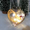 Heart shaped clear LED Christmas ornament with burlap and foam balls inside. - Christmas Heart