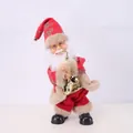 Close-up of a standing electric Santa Claus doll playing a golden saxophone for holiday decor - Grey Twisting Saxophone