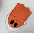 Orange ghost-shaped Halloween candy bag with white rope handle for kids. - Orange