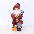 Detailed front view of an electric standing Santa Claus ornament with plaid outfit - Snowflake Light Santa