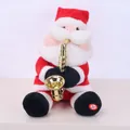 Detailed view of electric Santa Claus plush toy playing saxophone on white background - Sitting Saxophone