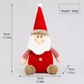 Vista frontale dello gnomo di peluche Babbo Natale con dimensioni per arredo natalizio - Babbo Natale Seduto in Maglia Beige (1509)