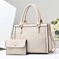 Elegant beige faux leather handbag and matching clutch set featuring luxury textured pattern - Tote Bag 2-Piece Set / Off White