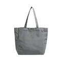 Detailed view of a minimalist grey canvas tote bag featuring a durable snap button closure - Gray