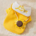 Close-up detail of yellow fleece pet sweatshirt with sunflower and love embroidery - Sunflower Hoodie