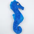 Detailed view of blue plush seahorse squeaky toy with textured soft fabric for pets - Blue Seahorse