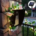 Dekorative solarbetriebene LED-Rosenblumengirlande für den Garten und die Terrasse im Freien - Hellrosa Rosenrebe / Batteriebetrieben 2m 20LEDs (Warmweiß)