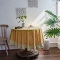 Modern yellow ruffled round tablecloth for dining table with vintage home decor background - Ginger Yellow and Beige