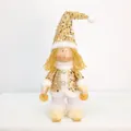 Detail of a Christmas girl plush doll with golden sequins and ski accessories. - Skiing Girl - Gold Sequin Style / Gold