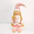 Detailed view of pink sequined Christmas girl doll with ski poles and fuzzy white scarf - Skiing Girl - Pink Gold Sequin Style / Pink