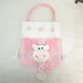 Vista dettagliata del sacchetto regalo renna di Natale in peluche rosa con bambola 3D e paillettes. - Stile Renna 3D / Rosa
