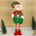 Detailed view of a Christmas elf plush doll with red and green sequined outfit and long legs - Male Telescopic Elf