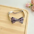 Detailed view of adjustable purple floral pet collar bow tie on a rustic bamboo tray. - One Size 23-40cm / Gray