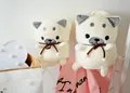 Detail view of rolled flannel blankets shaped like cute cream Shiba Inu dogs. - Shiba Inu / S / White