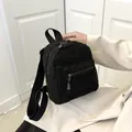 Elegante mini mochila de forro polar negro con textura de lana de cordero de invierno - Mini mochila / Negro