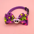 Close-up detail of a Halloween pet collar featuring a skull witch hat and purple bow. - Size XS (16-22cm) / Skull with Hat