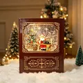 Weihnachtliche Schneekugel in Buchform mit Weihnachtsmann und warmem LED-Lichtdekor - Buch Rot Weihnachtsmann Schreibtisch Stil