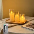 Drei LED flammenlose Kerzen mit transparenten Glashüllen und einer Funkfernbedienung - Schwingkopf 3er Set mit Fernbedienung / 3er Pack mit Fernbedienung