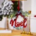 Close-up of wooden Christmas Noel ornament with red glitter finish and plaid bow - Wreath Style (Noel)