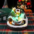 Illuminated Christmas snow house resin music box featuring a rotating train and LED lights - Round Snowman