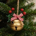 Festive golden Christmas bell ornament featuring a red checkered bow and berries - Gold Round Bell