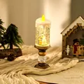 Detail showing festive Christmas water-filled candle lamp with nativity snow scene. - Nativity Scene Style / Brushed Gold