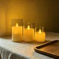 Set aus drei warm leuchtenden LED-Kerzen in eleganten transparenten Acrylglas-Zylindern - Schwingkopf / 3er Set (7.5*10/12.5/15cm)