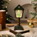 Detail of glowing Christmas tree inside vintage mailbox water light lantern decoration. - Brushed Green Christmas Tree
