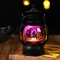 Macro view of purple Halloween oil lamp featuring skeleton and bat laser designs - Skull Pattern