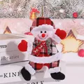 Plush snowman Christmas ornament with red plaid hat and gloves for tree decor - Plaid Dancing Snowman