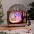 Caja de música TV retro navideña con luces LED de colores y escena de nieve que cae - Estilo Trineo de Renos
