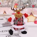 Plush Christmas reindeer ornament in red plaid outfit for holiday tree decoration - Plaid Dancing Reindeer