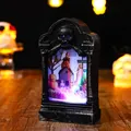 Detailed close-up of a glowing Halloween tombstone night light with spooky internal scene - Tombstone Shape / House Style