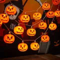 Warme orangefarbene Halloween-LED-Lichterkette mit klassischen Kürbis-Designs - Mittleres Kürbislicht / 1,5m