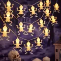 Halloween skeleton LED string lights with warm yellow glowing skull ornaments for party decor - Skull Lantern / 1.5m