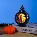 Halloween LED lantern featuring a grim reaper silhouette on a fashion book prop - Round Skull Style