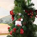 Handcrafted green fabric Christmas snowman pendant ornament hanging on a pine tree - Tree Shape Snowman