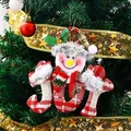 Festive fabric Christmas snowman doll ornament with JOY lettering on tree branches - JOY Snowman