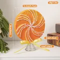 Orange swirl Christmas lollipop tree topper with yellow ribbon and dimensions 20cm height - Windmill Tree Top Star [Type A] (EJ0272S-Windmill A)